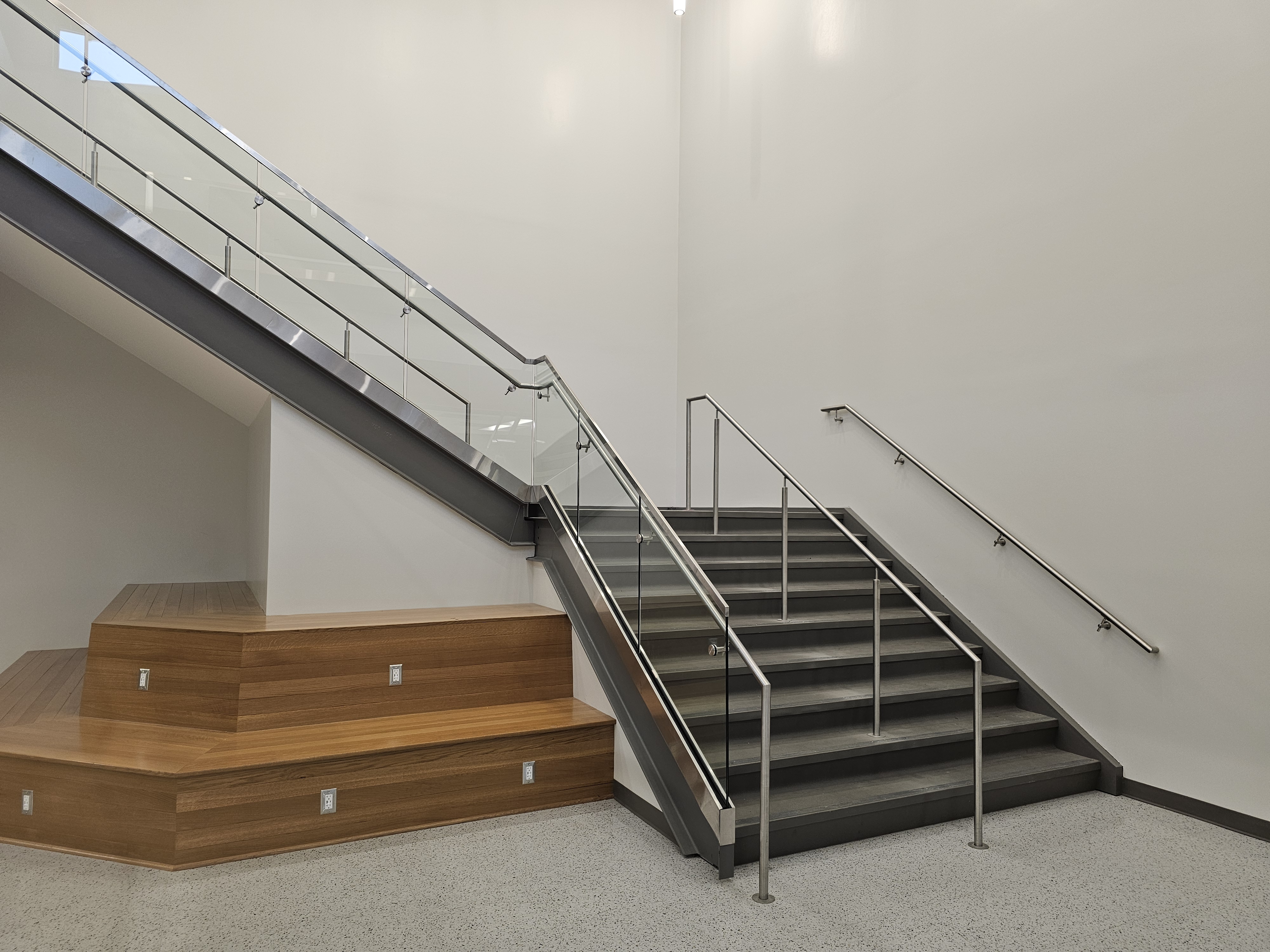 Custom stainless steel and glass railing installation